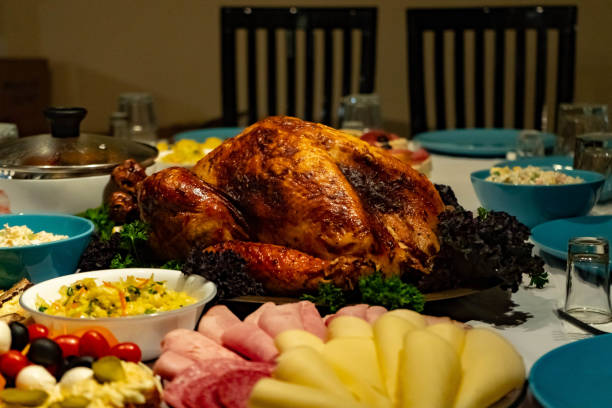 istock roasted turkey on holiday table, thanksgiving 1080016230