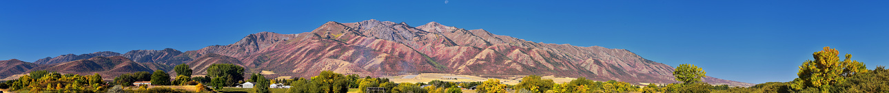 Logan Valley landscape views including Wellsville Mountains, Nibley, Hyrum, Providence and College Ward towns, home of Utah State University, in Cache County a branch of the Wasatch Range of the Rocky Mountains in Utah, in the Western United States.