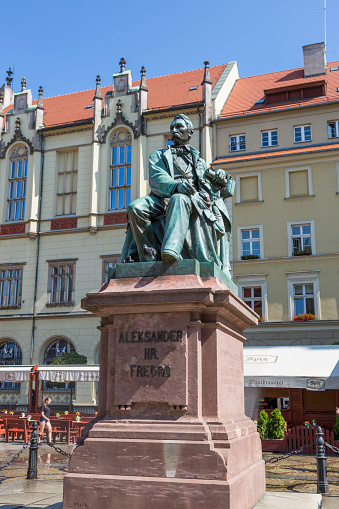 Wroclaw, Poland - July 09, 2018: Bronze monument to Polish poet and playwright Alexander Fredro in Wroclaw, Poland