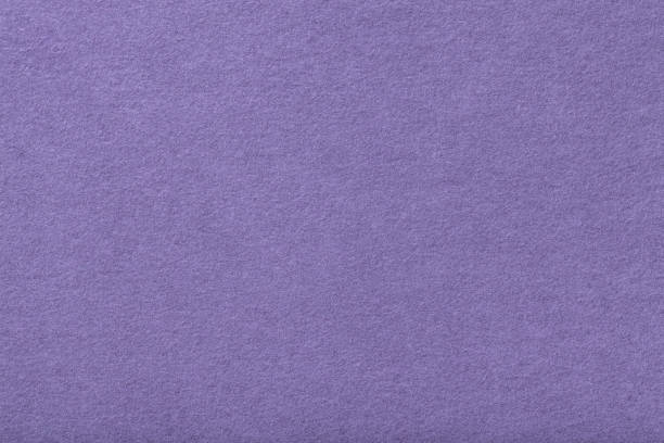 istock Light violet matt suede fabric closeup. Velvet texture of felt. 1080051180