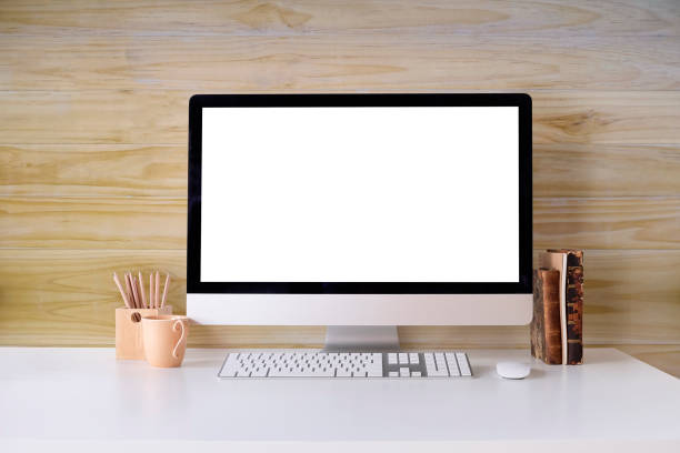 istock Workspace mockup computer, coffee mug, books on office desk. 1080063658