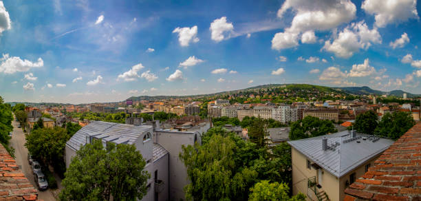Budapest Hungary May 28 2018: Panoramic view of Budapest.  City view from the Castle District. Many buildings, artworks are listed by UNESCO as a World Heritage site, and was first completed in 1265. Panoramic Image.