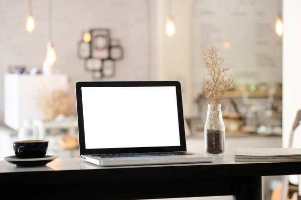 istock Mockup laptop computer on blur cafe background. 1080066450
