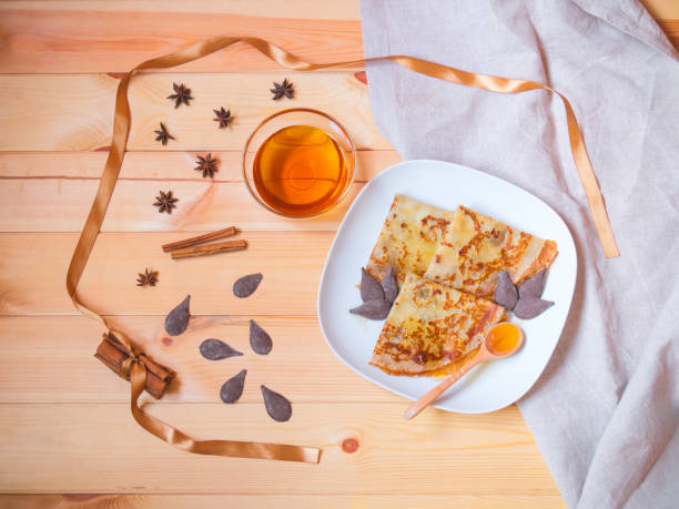 istock Homemade pancakes with honey, chocolate chips and spices. 1080081136