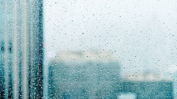Free Stock Photo of Cityscape view through a rainy window with water ...