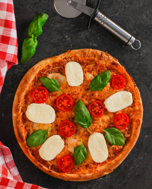 istock pizza, mozzarella, chicken, tomato sauce, vegetables, basil (pizza mozzarella tomato). food background. copy space 1080085520