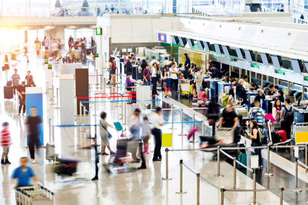 istock Crowd of people waiting for check-in 1080085816