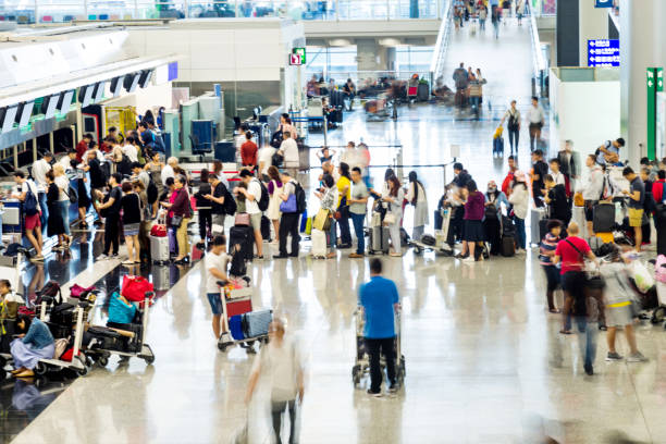 istock Crowd of people waiting for check-in 1080085942
