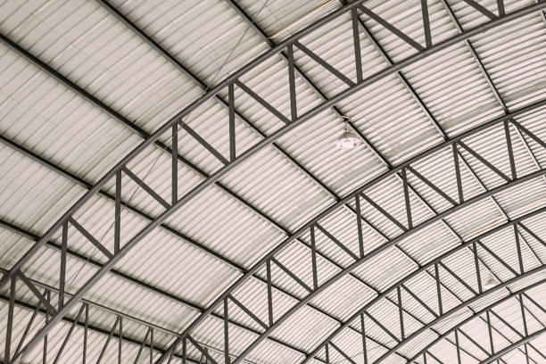 istock Pattern of steel roof framework, Curve roof steel design structure with galvanized corrugated roofing tile steel sheet. 1080087392