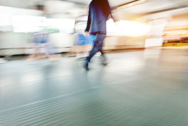 istock Businessman walking on city footbridge 1080087834