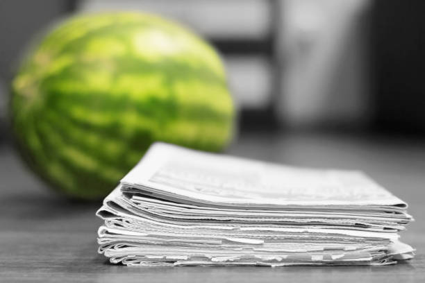 istock Newspapers and watermelon 1080089360