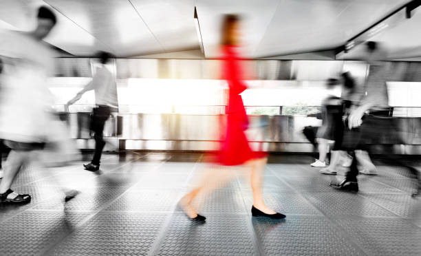 istock Blurred people walking in a corridor 1080091802