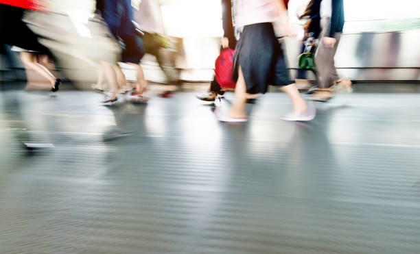 istock People walking in corridor at rush hour 1080092840