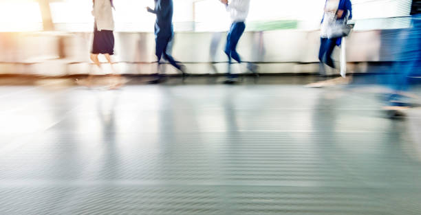 istock Businessman walking on city footbridge 1080092920