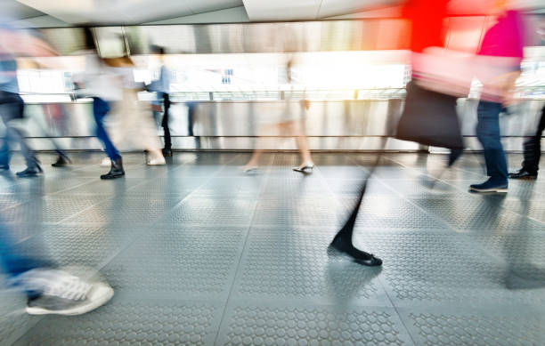 istock People walking in corridor at rush hour 1080093276