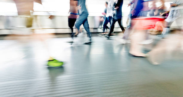 istock People walking in corridor at rush hour 1080093280