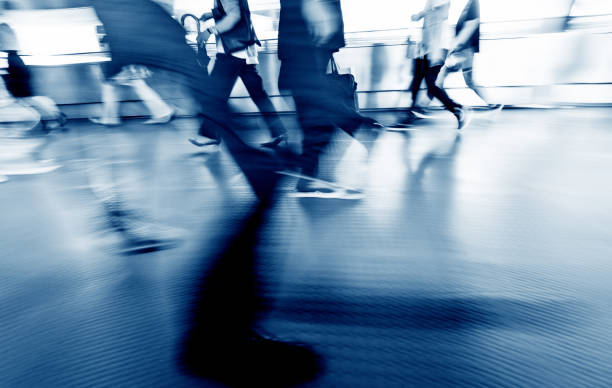 istock People walking in corridor at rush hour 1080093382