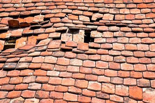 Solar panels off the roof, broken tiles