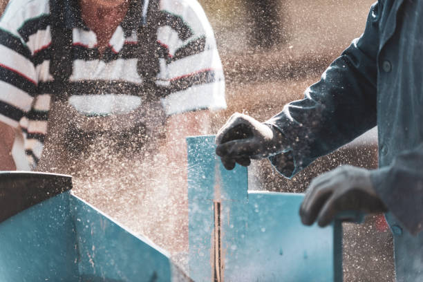 istock Cutting of wood with a circular saw 1080099724