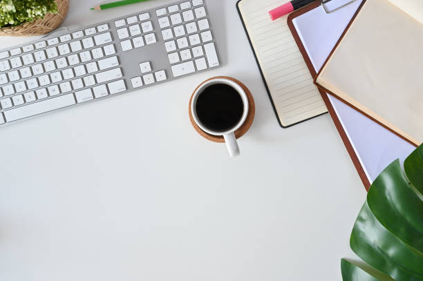 istock Office desk concept, Top view workspace hipster with computer, coffee, books and leaf decoration. 1080100980