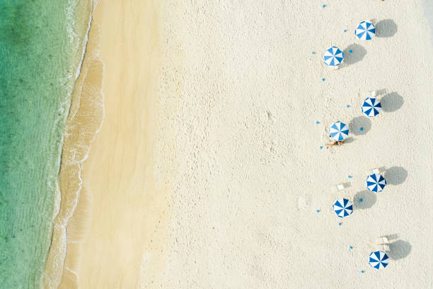 People who relax on a beautiful sea and beach