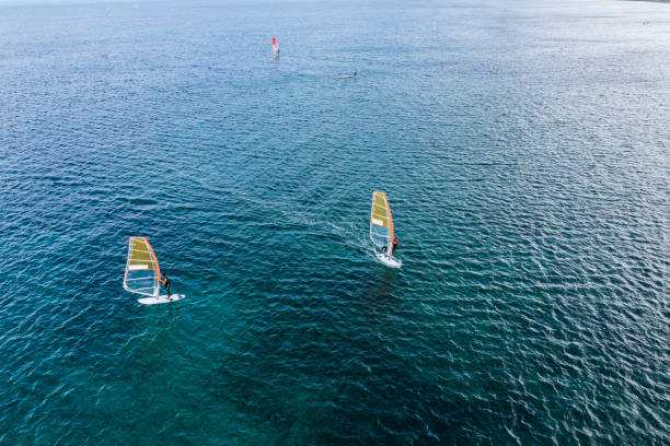 istock Three yachts crossing the beautiful sea 1080104178