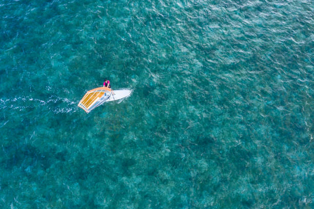 istock Okinawa's beautiful sea and one yacht 1080104370