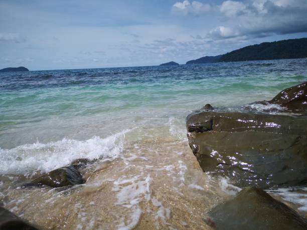 istock Beautiful wave breaks to the shore and it called swash. 1080106574