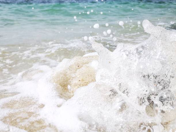 istock Beautiful wave breaks to the shore and created a beautiful swash on the beach. 1080107070