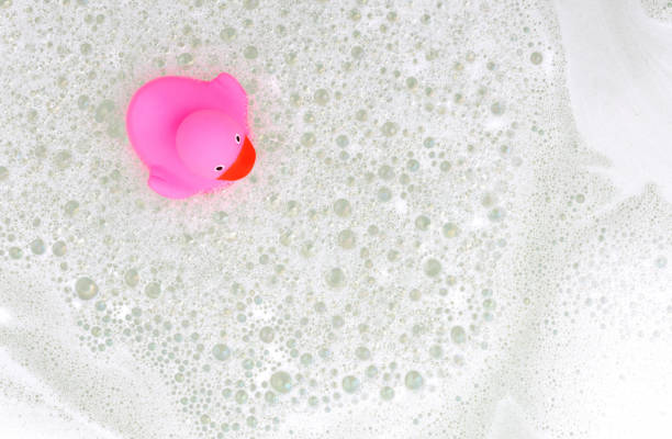 istock Pink duck in a bathtub 1080107904