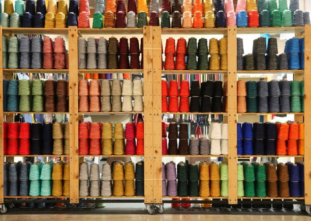 istock shelf of haberdashery with lots of threads 1080109162
