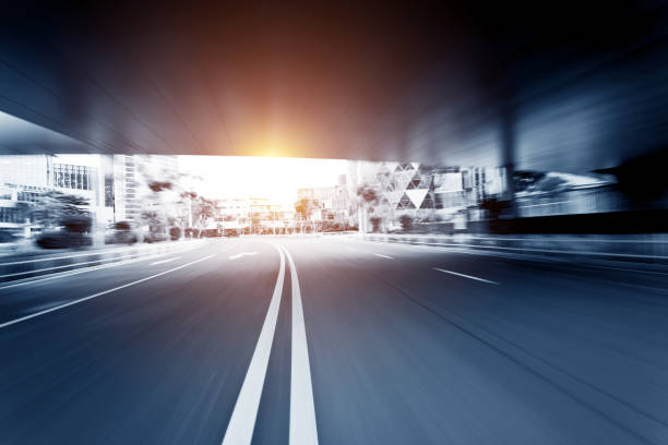 istock Blurred motion traffic on city street 1080110538