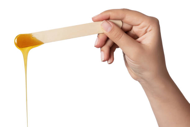 istock Honey wax on a spatula - Isolated 1080111344