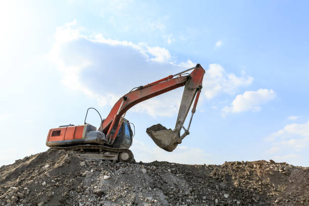istock Excavator working at building site on sunny day 1080119522