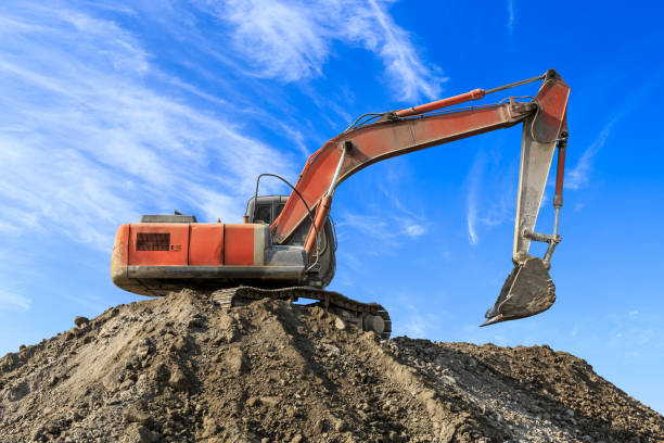 istock Excavator working at building site on sunny day 1080119770