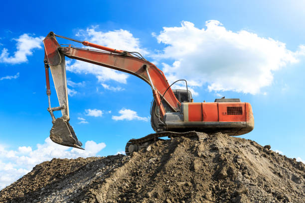 istock Excavator working at building site on sunny day 1080120314