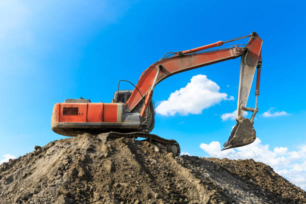 istock Excavator working at building site on sunny day 1080120324
