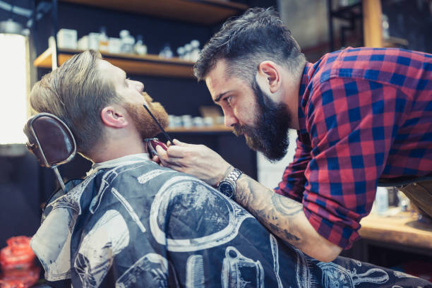 istock Ginger, bearded guy at the barber shop 1080120394