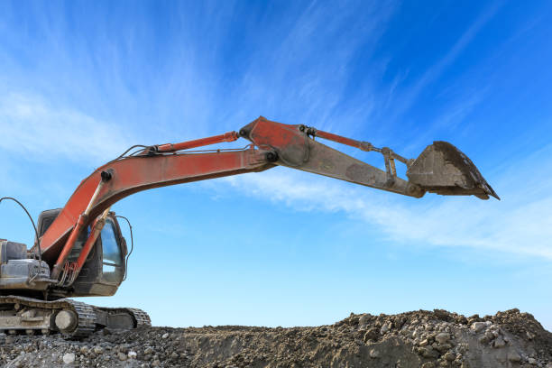 istock Excavator working at building site on sunny day 1080120476