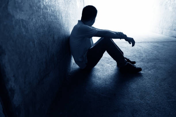 istock Desperate man sitting in the tunnel 1080121404
