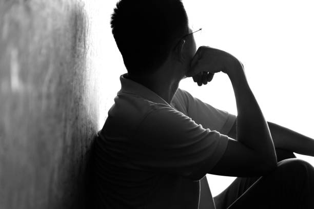 istock Desperate man sitting in the tunnel 1080122756