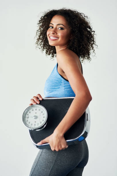 istock She's determined to change the number on the scale 1080129478