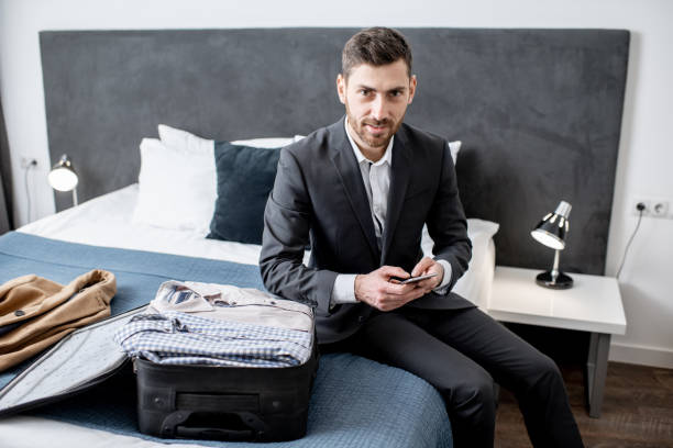 istock Businessman in the hotel room 1080132624