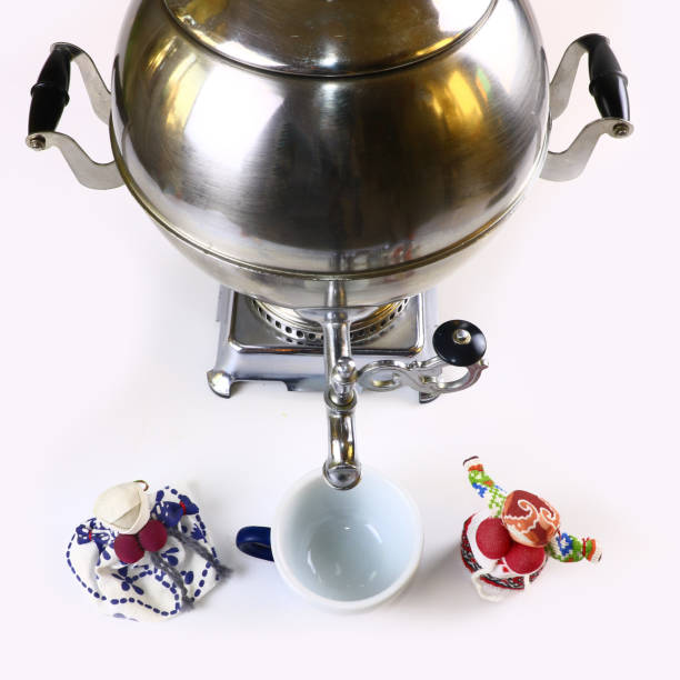 istock Samovar, Russian national souvenir, Russian folk ritual doll and whith cup on a white background 1080140030