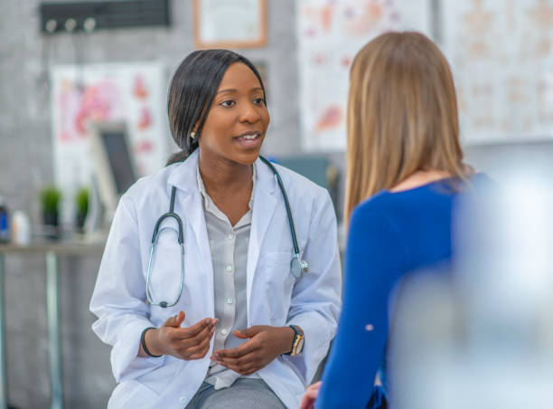 istock Woman talking to doctor 1080140078