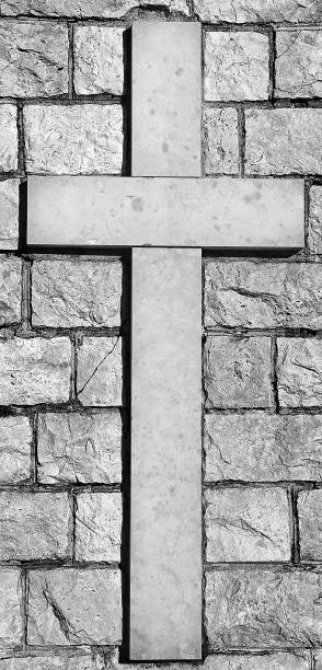 istock cross carved on marble 1080140834