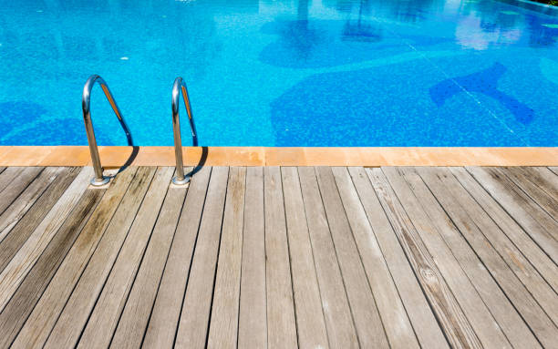 istock Swimming pool with metal ladder 1080140894