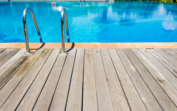 istock Swimming pool with metal ladder 1080140900