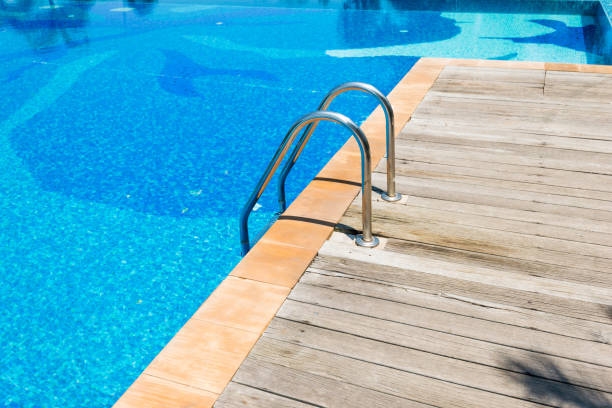 istock Swimming pool with metal ladder 1080141986