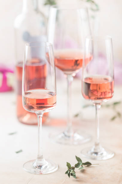 istock Glasses and bottle of rose wine 1080142778